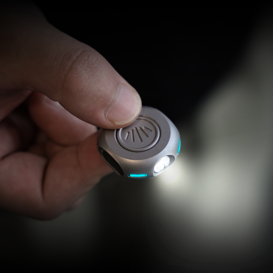 The MiCoin - Titanium Coin-Sized Rechargeable Flashlight