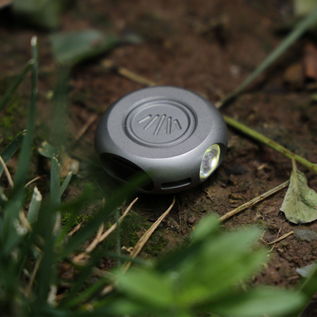 The MiCoin - Titanium Coin-Sized Rechargeable Flashlight