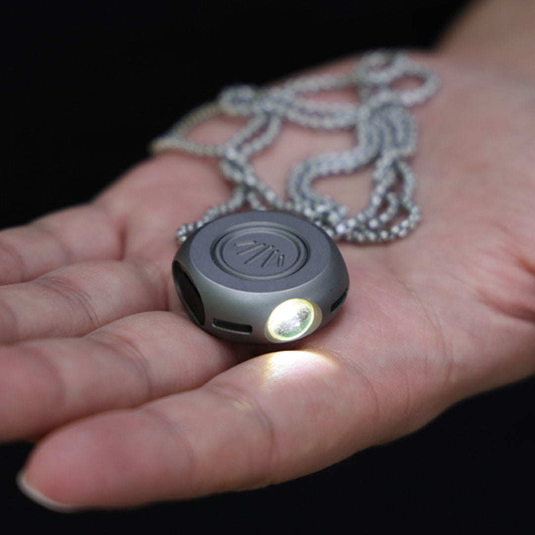 The MiCoin - Titanium Coin-Sized Rechargeable Flashlight