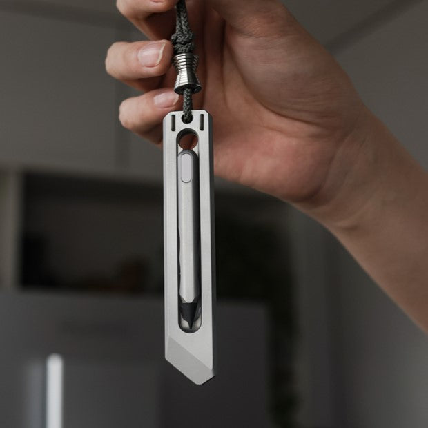 The BookBond Pen-Your Titanium Multitool Bookmark Companion