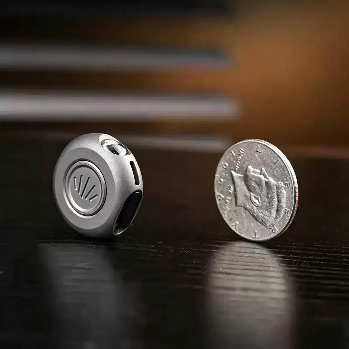The MiCoin - Titanium Coin-Sized Rechargeable Flashlight