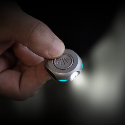 The MiCoin - Titanium Coin-Sized Rechargeable Flashlight
