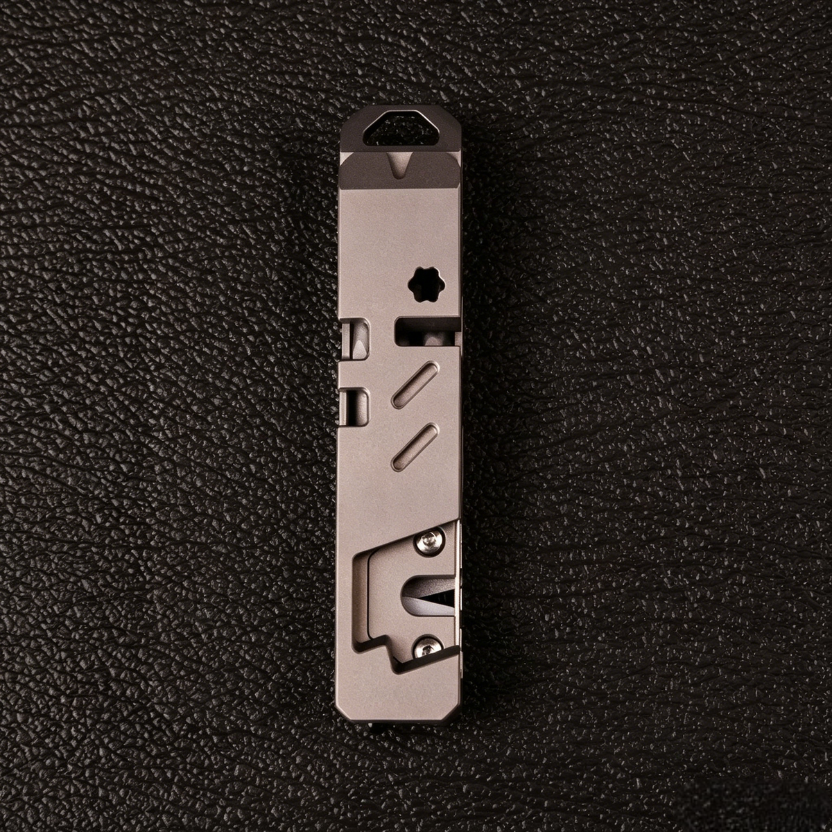 The TriPro Stand: 15-in-1 Titanium EDC Tool and Phone Stand