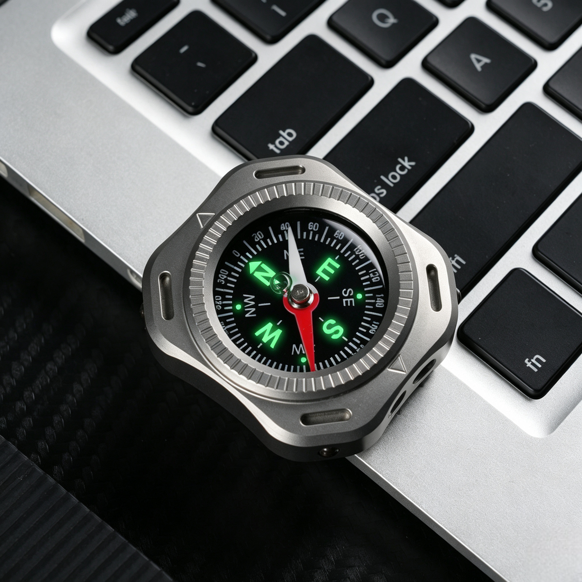 CompaX — A Titanium Compass with Multiple Carry Options