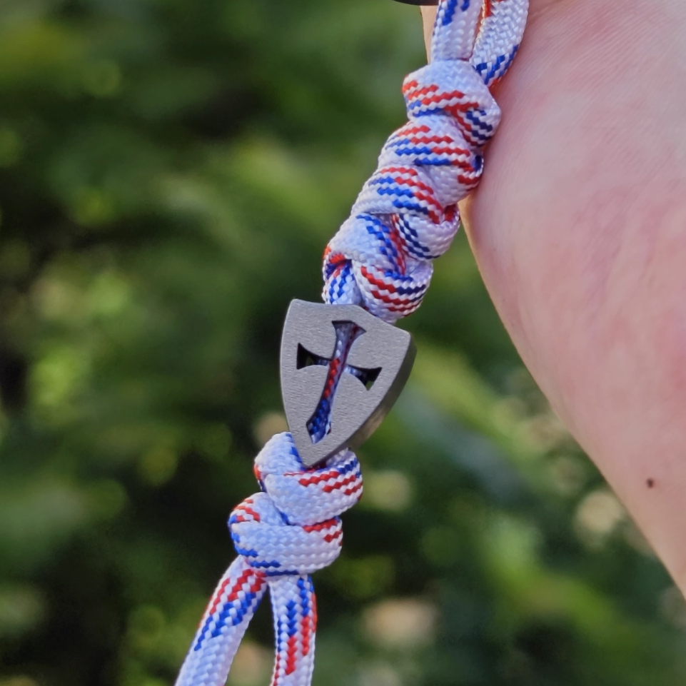 Cross-Cutout Titanium Bead