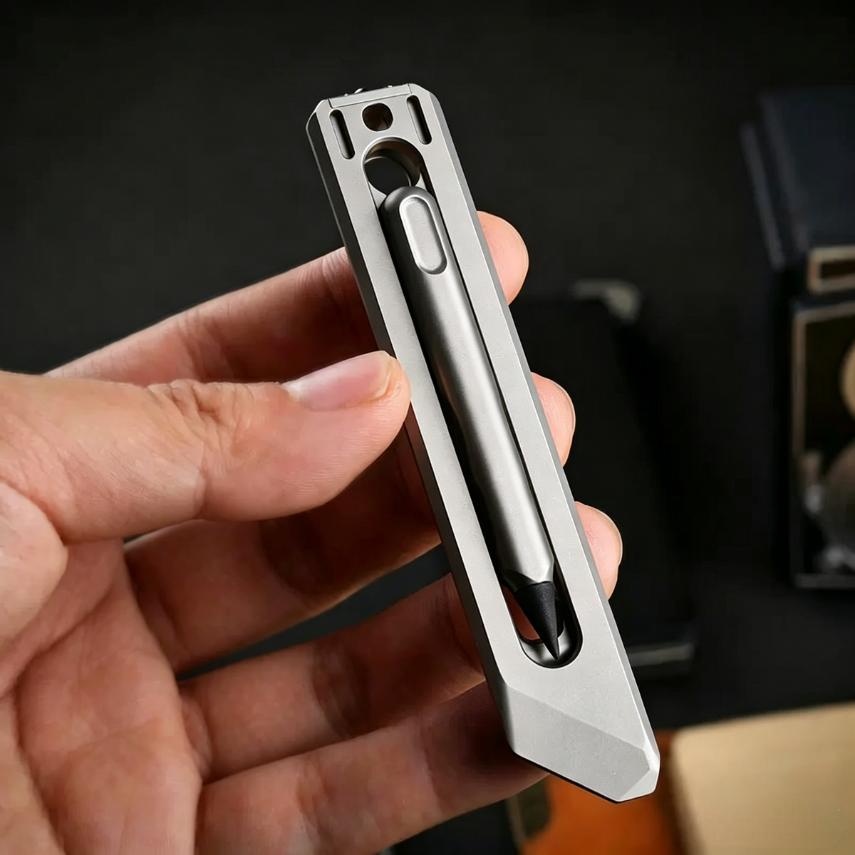 The BookBond Pen-Your Titanium Multitool Bookmark Companion