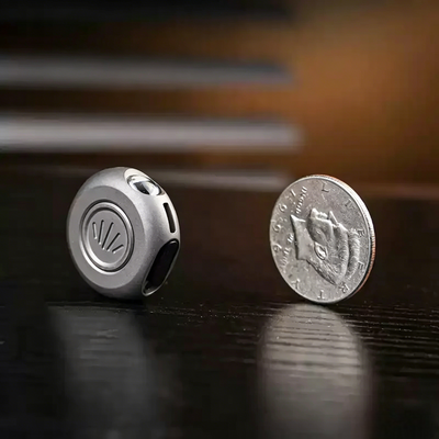 The MiCoin - Titanium Coin-Sized Rechargeable Flashlight