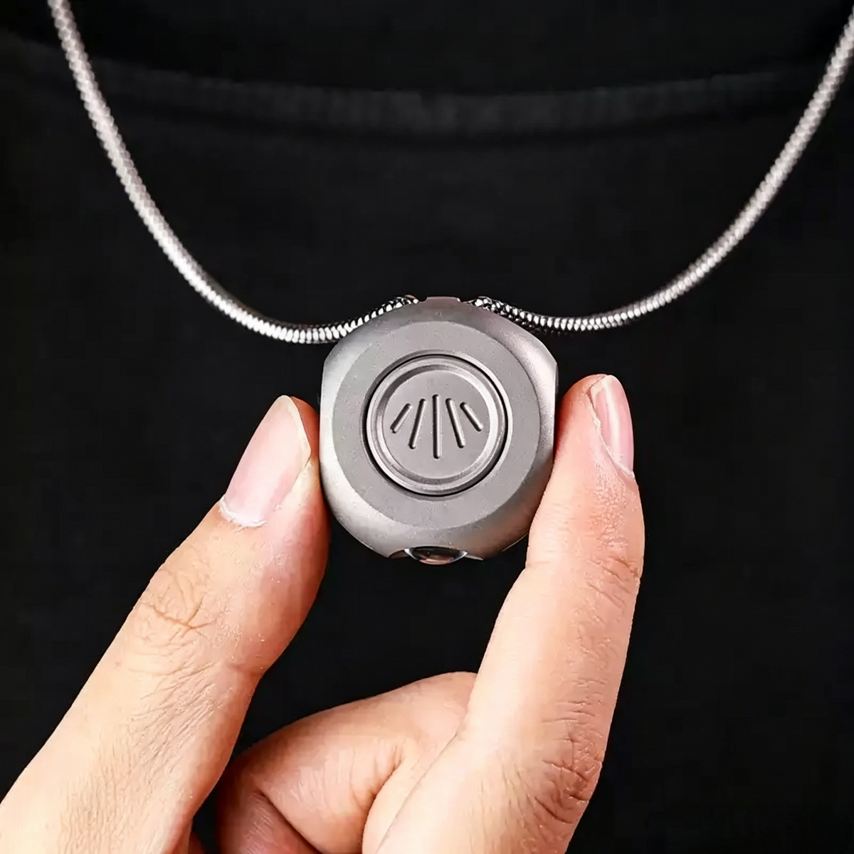 The MiCoin - Titanium Coin-Sized Rechargeable Flashlight
