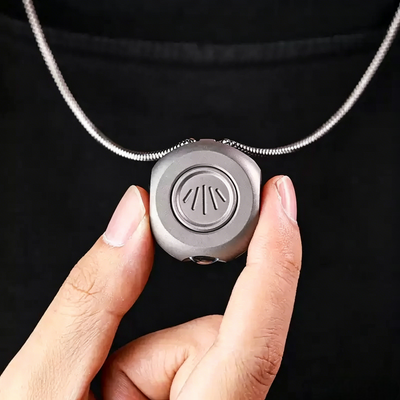 The MiCoin - Titanium Coin-Sized Rechargeable Flashlight