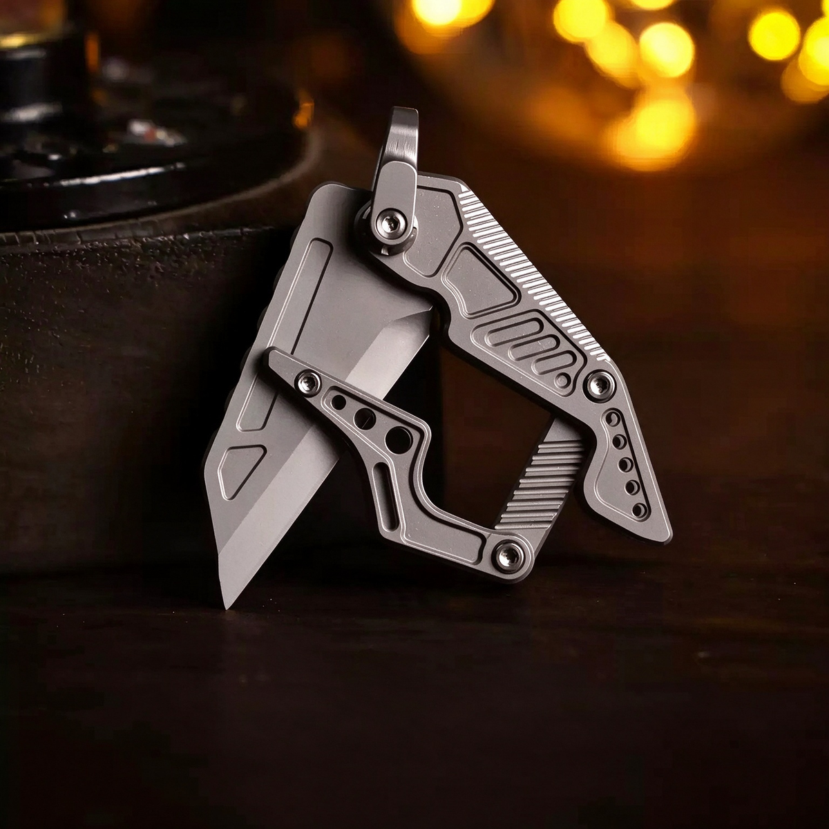 LINKFIN: A Compact Sliding-Link Cutter for Everyday Use