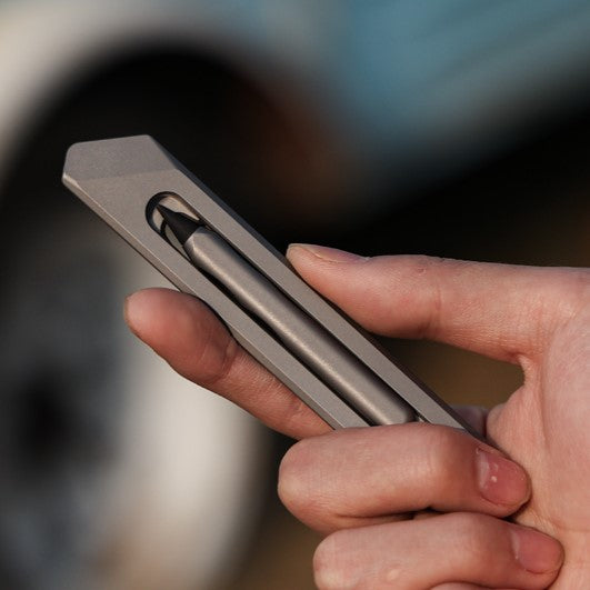 The BookBond Pen-Your Titanium Multitool Bookmark Companion